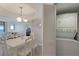 Convenient laundry closet with a stackable washer and dryer, maximizing space and efficiency at 1340 Gulf Blvd # 16F, Clearwater, FL 33767