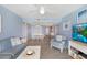 Stylish living room with an adjacent dining area, comfortable seating, and modern decor at 1340 Gulf Blvd # 16F, Clearwater, FL 33767