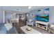 Open-concept living area with elegant dining space, a cozy seating area, and plenty of natural light at 1340 Gulf Blvd # 16F, Clearwater, FL 33767