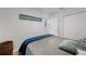 Well-lit bedroom, featuring a closet and wall art to enjoy and add to the ambiance at 1711 N Highland Ave, Clearwater, FL 33755