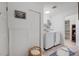 Bright laundry room with new washer and dryer at 1711 N Highland Ave, Clearwater, FL 33755