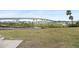 Scenic park view overlooking the water, with a large bridge spanning the horizon, and palm trees under a blue sky at 1711 N Highland Ave, Clearwater, FL 33755