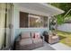 Comfortable outdoor patio with seating and lush greenery, perfect for relaxing and enjoying the weather at 1711 N Highland Ave, Clearwater, FL 33755