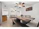 Open floor plan featuring an eat-in kitchen with modern dining table and seating at 18093 Ohara Dr, Port Charlotte, FL 33948