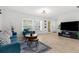 Living room with modern furnishings and natural lighting at 18093 Ohara Dr, Port Charlotte, FL 33948