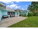 Inviting front patio with comfortable seating, perfect for enjoying the outdoors at 1825 Welland Dr, Clearwater, FL 33756