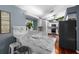 Modern kitchen with sleek countertops, stainless steel appliances, and ample cabinet space at 1825 Welland Dr, Clearwater, FL 33756
