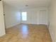 This is a spacious living area with tile floors, a front door, and a closet providing great storage at 201 Faithway Dr, Seffner, FL 33584