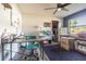 Spacious office featuring neutral walls, laminate flooring, desk and large window with natural light at 23067 Brighton Pl, Land O Lakes, FL 34639