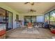 Spacious patio with tile flooring and a dining set, perfect for outdoor entertaining at 23067 Brighton Pl, Land O Lakes, FL 34639