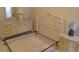 Well-lit bedroom featuring furniture including headboard and nightstand at 2459 Franciscan Dr # 29, Clearwater, FL 33763