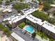 An aerial shot of the community, highlighting the refreshing pool and ample parking available for residents at 2525 W Bay Dr # A46, Largo, FL 33770