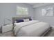 Stylish bedroom showcasing modern bedside lamps, a neutral color palette, and natural light at 2525 W Bay Dr # A46, Largo, FL 33770