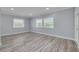 A light and airy bedroom with a neutral color scheme and updated flooring at 2525 W Bay Dr # A46, Largo, FL 33770