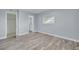 Bright bedroom with hardwood floors and closet at 2525 W Bay Dr # A46, Largo, FL 33770