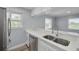 Modern kitchen with stainless steel appliances and bright countertops at 2525 W Bay Dr # A46, Largo, FL 33770