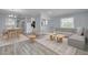 The living room and dining area have updated flooring and light, neutral paint at 2525 W Bay Dr # A46, Largo, FL 33770