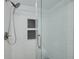Modern shower with white subway tile and glass door at 2525 W Bay Dr # A46, Largo, FL 33770