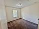 Bedroom with neutral walls, carpet and a window with horizontal blinds at 2612 E 26Th Ave, Tampa, FL 33605