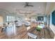Spacious clubhouse with a bar, seating areas, and large windows offering ample natural light at 2812 Long Bow Way, Odessa, FL 33556