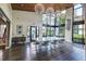 Interior view of clubhouse featuring high ceilings, large windows, modern decor, and an inviting atmosphere at 2812 Long Bow Way, Odessa, FL 33556