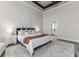 This stylish main bedroom provides a view of the ensuite bathroom at 2812 Long Bow Way, Odessa, FL 33556