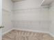 Walk-in closet offers an abundance of storage space at 2812 Long Bow Way, Odessa, FL 33556