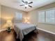 Bedroom with hardwood floors, neutral walls and plantation shutters on the windows allowing for lots of natural light at 3354 52Nd N St, St Petersburg, FL 33703