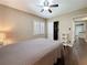 Bedroom with a ceiling fan, hardwood floors, and a closet at 3354 52Nd N St, St Petersburg, FL 33703