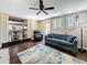 Living area showcasing hardwood floors, plantation shutters, and access to the backyard at 3354 52Nd N St, St Petersburg, FL 33703