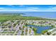 The aerial view shows a waterfront neighborhood with gorgeous waterways and scenic views at 3519 Richboro Dr, Holiday, FL 34691