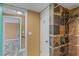 Stylish tiled shower features built-in shelving; bathroom entrance nearby at 3519 Richboro Dr, Holiday, FL 34691