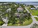 Aerial shot of the home in its neighborhood, highlighting its prime location at 358 Highland Shores Dr, Ellenton, FL 34222