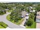 Drone shot displays the home and surrounding area, emphasizing its lot and landscaping at 358 Highland Shores Dr, Ellenton, FL 34222