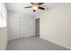 Bedroom features closet, ceiling fan and new carpet at 358 Highland Shores Dr, Ellenton, FL 34222