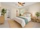 Bedroom with a queen-sized bed and two windows at 358 Highland Shores Dr, Ellenton, FL 34222