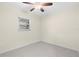 Bedroom with neutral paint, carpet, and a window at 358 Highland Shores Dr, Ellenton, FL 34222