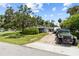 Street-level shot of the home, showcasing its charming facade and curb appeal at 358 Highland Shores Dr, Ellenton, FL 34222