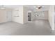 Living room featuring updated flooring and view to the kitchen at 358 Highland Shores Dr, Ellenton, FL 34222