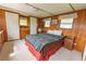 Bedroom with natural light, closet, fan and matching nightstands and dressers at 37302 Carol Ave, Zephyrhills, FL 33542