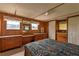 Bedroom with natural light, two closets and matching dressers at 37302 Carol Ave, Zephyrhills, FL 33542