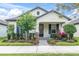 Charming single-story home with well-manicured landscaping and inviting front porch at 3800 Night Star, Odessa, FL 33556