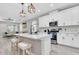 Bright and airy kitchen with a kitchen island and stylish pendant lighting at 3800 Night Star, Odessa, FL 33556