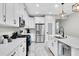 Well-equipped kitchen with stainless steel appliances and ample counter space at 3800 Night Star, Odessa, FL 33556