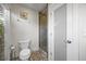 Cozy bathroom featuring a glass shower and decorative stone floors at 3956 Versailles Dr, Tampa, FL 33634
