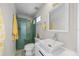 Bathroom featuring mosaic tile shower and modern sink and vanity at 3956 Versailles Dr, Tampa, FL 33634