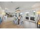 Dining room showcasing a modern light fixture and views of the outdoor patio and waterfront at 3956 Versailles Dr, Tampa, FL 33634