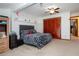 Bright bedroom with decorations on the wall, closet, and ceiling fan at 4205 Helene Pl, Valrico, FL 33594