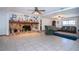 Large open living space with a stone fireplace, tile floors, and ample room for furniture at 4205 Helene Pl, Valrico, FL 33594