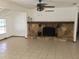 Large living room featuring a fireplace and tile flooring throughout at 4205 Helene Pl, Valrico, FL 33594